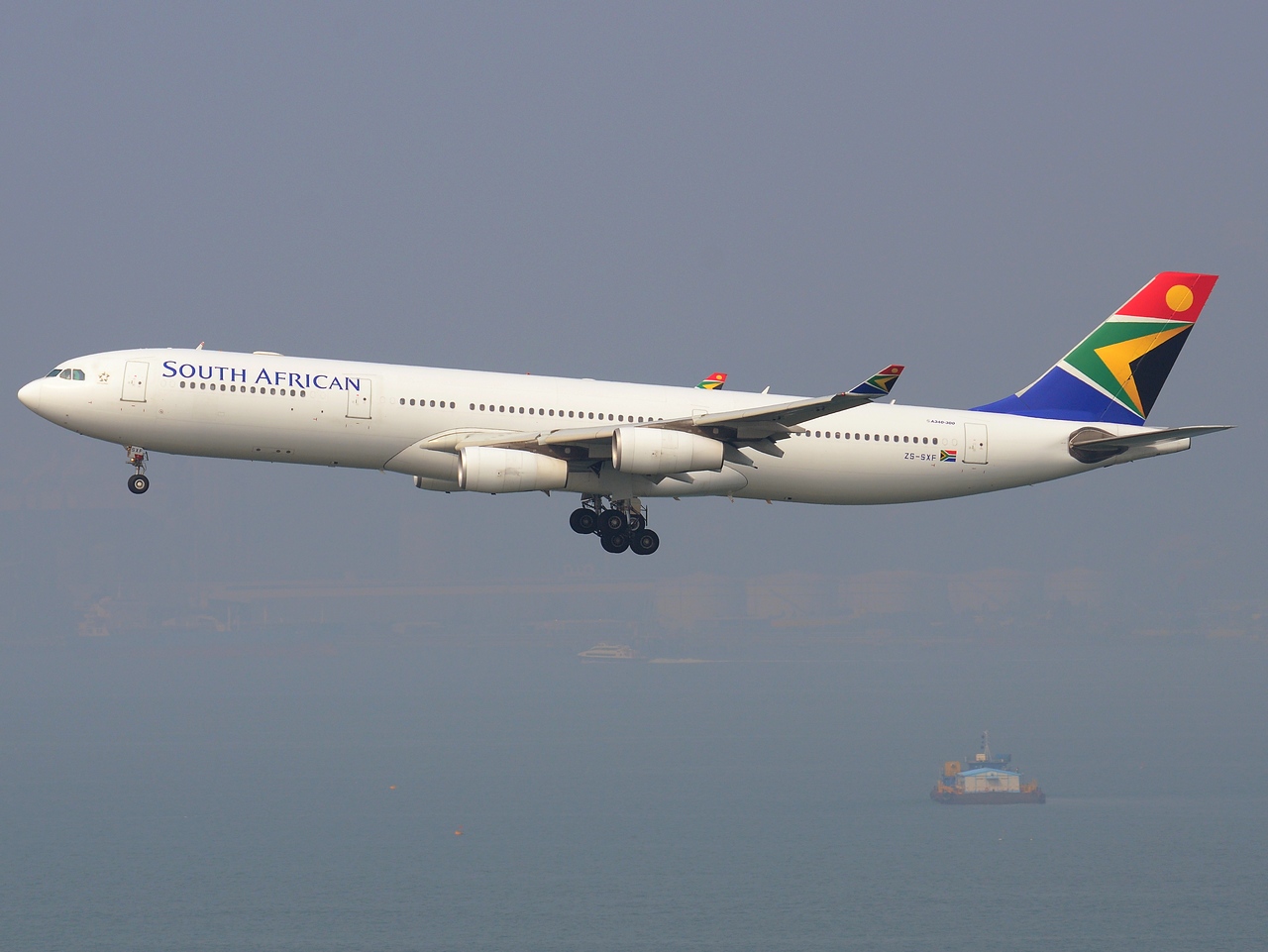 ZS-SXF - A340-313 - South African Airways - HKG - 23-01-2013